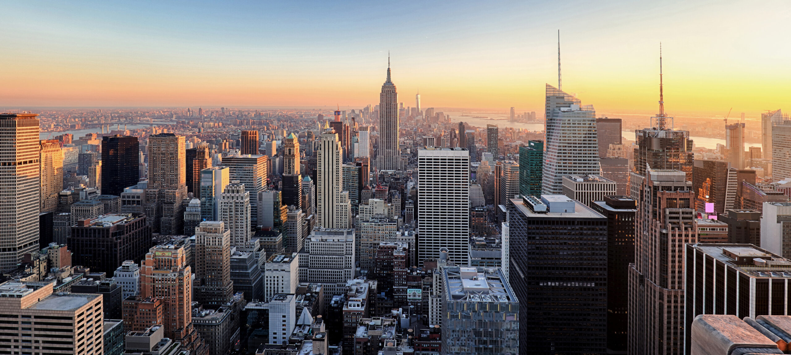 New,York,City.,Manhattan,Downtown,Skyline,Skyscrapers,At,Sunset.